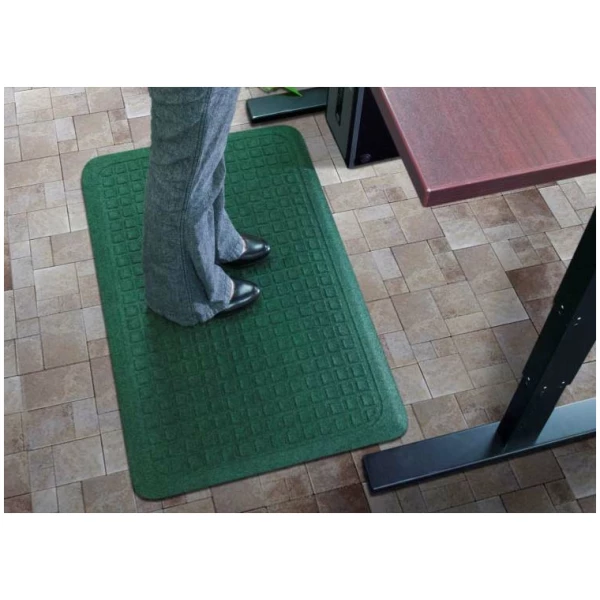 Get Fit Stand Up 1 1 Floormat.com These Get Fit Stand Up Anti-fatigue Mats are ideal for standing desks and other standing work areas. The anti-fatigue indoor mats are designed to provide workers a comfortable surface to stand on for hours and hours. Standing at your desk can burn up to 40% more calories while reducing neck & back pain. Do it for your health Get Fit with these Stand Up Anti-fatigue Mats. <ul> <li>100% solution-dyed polypropylene top surface will not fade</li> <li>5/8” thick closed cell Nitrile blended cushion</li> <li>Beveled borders will not crack and curl</li> <li>Made in the USA</li> </ul>