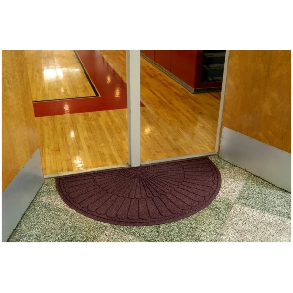 waterhog grand classic 2 Floormat.com Fashionable Wiper - Scraper Mat with Fabric Border <ul> <li>3/8” thick bi-level surface effectively removes and stores dirt and moisture beneath shoe level</li> <li>Rubber reinforced face nubs prevent pile from crushing extending performance life of product</li> <li>Unique “Water Dam” allows the Waterhog mat to trap water and dirt stay on mat</li> <li>6'x7' and 6'x10' are not available in aquamarine, gold, light green, orange, purple, solid red, white, yellow</li> </ul> If you are looking for all of the performance features and exceptional beauty of the Waterhog Eco Grand Premier - but would prefer them in a 24 ounce option, WaterHog Grand Classic is the perfect choice. It offers the same durable fabric border as well as 3 configurations to give you the ultimate in beauty and performance. <ul> <li>Durable 24 oz./sy. polypropylene bi-level face maximizes dirt and moisture stopping characteristics.</li> <li>A <b>green friendly rubber backing</b> made of 10-15% recycled rubber content.</li> <li>Special Tri-Grip cleated backing.</li> <li>Anti-static.</li> <li>100% solution-dyed to eliminate fading.</li> <li>All Waterhog Mats are certified slip resistant by the National Floor Safety Institute.</li> </ul> <img class="alignright size-full wp-image-14975" src="https://www.floormat.com/wp-content/uploads/waterhog-color-full-1.jpg" alt="" width="1380" height="232" />