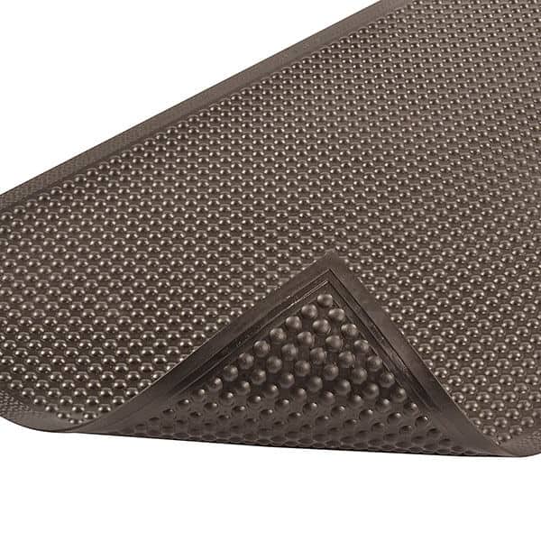 A Comfort-Eze Floor Mat with perforations.