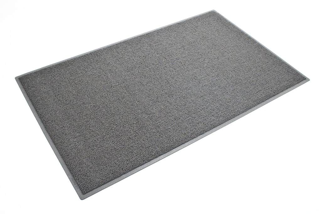 A gray door mat on a white background.