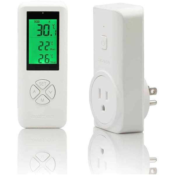 A white Programmable Outlet Plug-In Thermostat thermometer next to a plug.