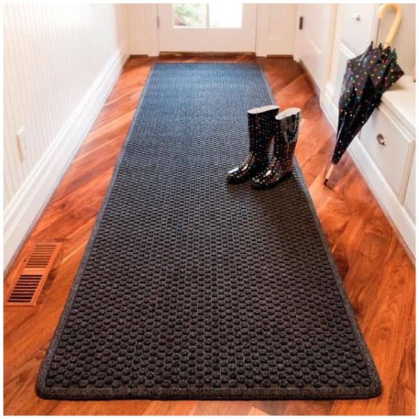 Aqua Trap Entry Mat 1 Floormat.com Aqua Trap® is a unique yet highly functional indoor entrance mat with a molded bubble pattern that facilitates the scraping and drying process while the patented raised “Aqua Dam™” border forms a perimeter that traps moisture and debris. Aqua Trap® features an antimicrobial carpet treatment that stops bacteria and germs at the entrance. An extremely durable rubber backed mat, Aqua Trap® has a highly fashionable look that features carpet-to-the-edge to blend with its surroundings and contemporary color choices to match any décor. <ul> <li>Moulded bubble pattern facilitates scraping and drying</li> <li>Aqua Dam™ border retains moisture and debris</li> <li>Carpet-to-the-edge construction to blend with its surroundings</li> <li>Rubber underside cleat design resists mat slippage</li> <li>Available in continuous lengths up to 60 feet</li> </ul>