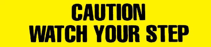 Caution sign with Wooster Products Flex-Tred® Anti-Slip Tape