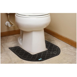 A bathroom with a CleanShield™ Commode Mat on the floor.