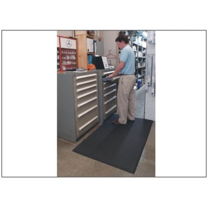 A man standing in front of a drawer in a store.