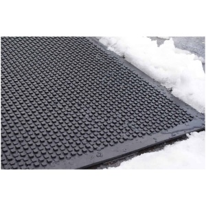 A black HOT-blocks™ Door / Landing mat with snow on it.
