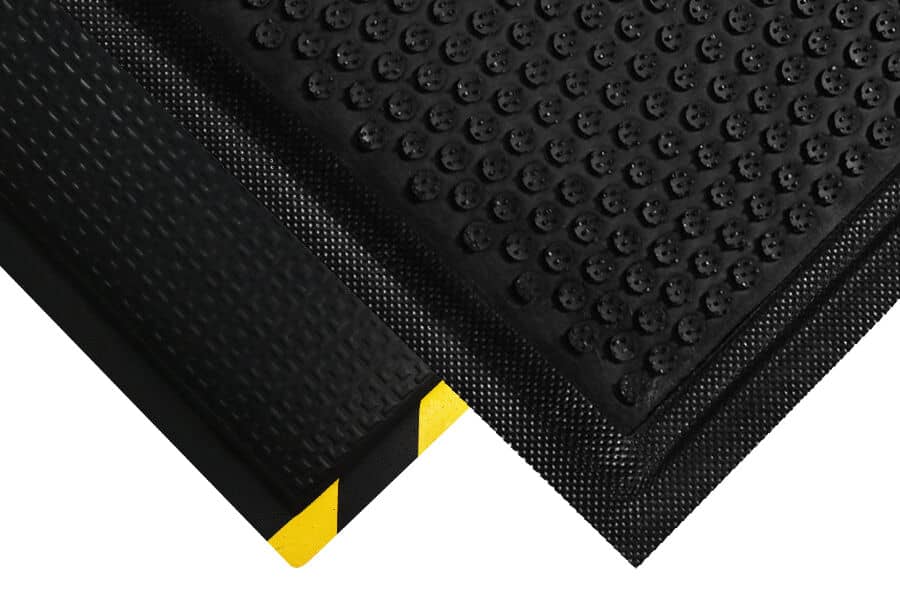 Two stacked DuraComfort Grip Floor Mats.