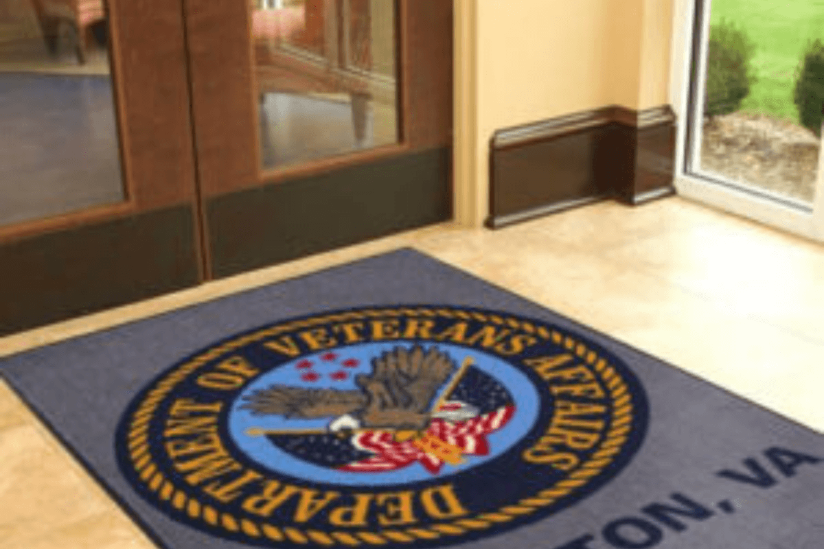 A door mat with the logo of the virginia veteran's administration.