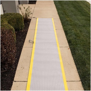 A building walkway with a ProHeat Snow Melting Floor Mat.