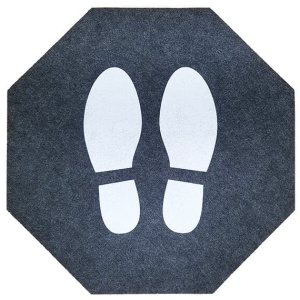 An octagon shaped Stick-and-Stand Floor Mat.