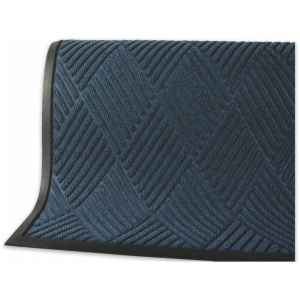 A blue door mat with black trim.