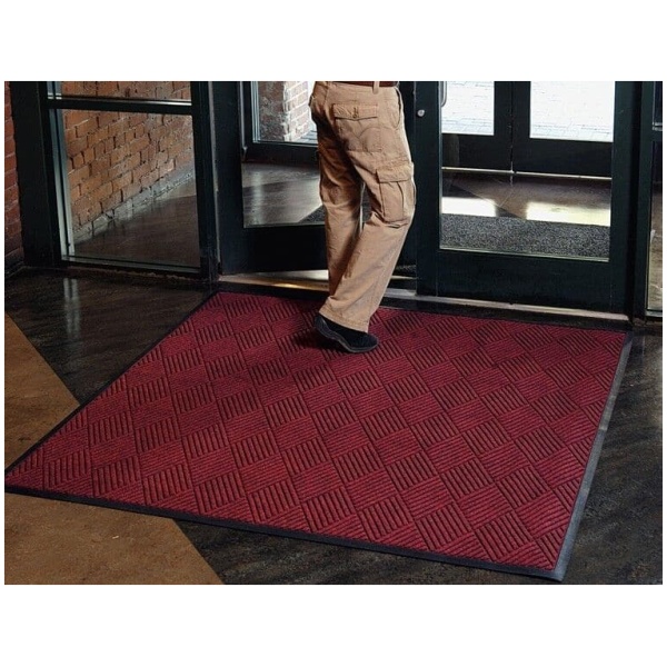 Waterhog Classic Diamond 3 Floormat.com This indoor/outdoor entrance scraper mat is made of a 24 oz.sq/yd Polypropylene fiber system that dries quickly and won't fade or rot. <ul> <li>3/8” thick bi-level surface effectively removes dirt and moisture beneath shoe level</li> <li>Rubber reinforced face nubs prevent pile from crushing extending performance life of product</li> <li>Unique “Water Dam” and ridged construction effectively holds dirt & moisture between cleaning</li> </ul>