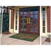 A doormat with the word dulis on it.