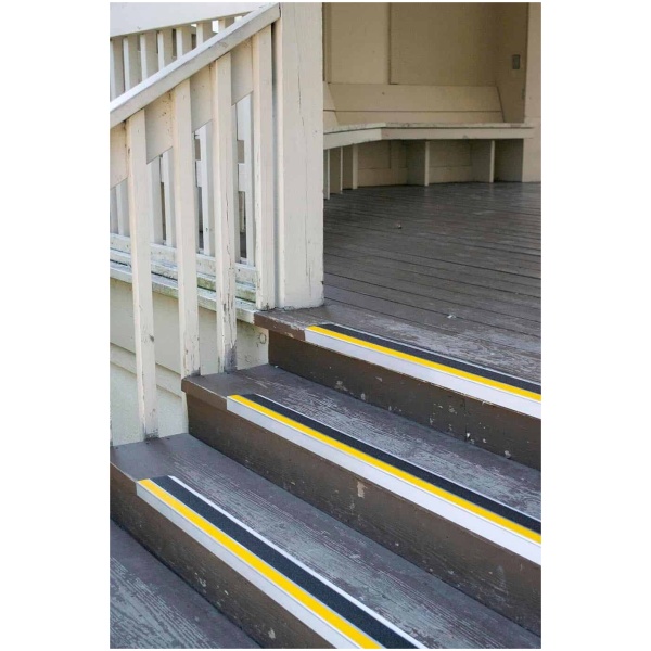 bold step 2 Floormat.com <h4><strong>This item is sold by the foot. Be sure to order enough for your project.</strong></h4> Slip-resistant treads for indoor or outdoor staircases <ul> <li>sold by the foot</li> <li>specialized coating helps our stair treads to resist chips, dirt, scratches, stains and oil.</li> <li>stair treads can be used on exterior and interior flooring surfaces</li> <li>Our treads can be customized to complement the existing architecture of any building.</li> </ul> <h2>Bold Step Anti-slip Safety Renovation Treads</h2> These stair treads and nosings are an eye-catching, resilient, slip-resistant product for use on steps that require an anti-slip surface. Used in new construction or renovation projects, our treads and nosings deliver maximum safety and durability while providing a look to compliment building designs. Bold Step is strong enough for industrial applications, but attractive enough to be used at your residence. Designed for use on interior or exterior steps and landings, the treads feature an anti-slip coating system that resists chips, scratches, dirt, stains and oils Many Standard Colors Black • Gray • Yellow • White Red • Blue • Green • Brown Glow in the Dark and custom colors are available Ideal for use on wood steps, ramps, landings, and walkways. Also for use on concrete, steel, terrazzo, slate, and marble, inside or out! <b>Bold Step</b> Features: <ul> <li>Anti-slip safety surface</li> <li>No removal of existing stairs</li> <li>Visibility line safety contrast</li> <li>Easily cleaned</li> <li>Quick, simple installation</li> <li>Reasonable cost</li> <li>Long life durability</li> <li>Inside or outside use</li> <li>Aesthetically pleasing design</li> <li>All treads are pre-drilled with countersunk holes</li> <li>Fasteners available</li> <li>Custom miter cut-outs</li> </ul> <form action="https://www.aitsafe.com/cf/addmulti.cfm" method="post"> <p class="pthdr"><b>Master Stop Bold Step Anti-Slip Renovation Treads from Sure-Foot Industries</b> Offered in standard and custom colors in lengths up to 12 ft., price below covers standard two color treads</p> <h4><strong>This item is sold by the foot. Be sure to order enough for your project.</strong></h4> </form>
