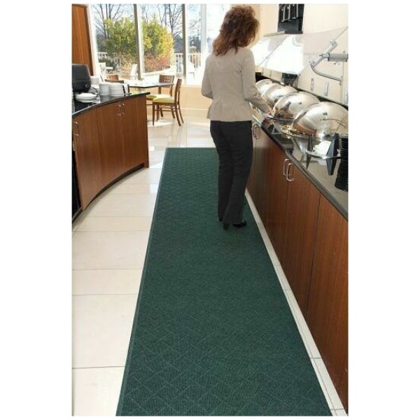 buffet line e1645154291999 Floormat.com Recycled PET carpet face and recycled tire rubber back make this wiper mat an excellent "Green" choice <ul> <li>Anti-Static, smooth backing only</li> <li>0 oz. sq/yd 100% post consumer recycled PET fabric from plastic bottles</li> <li>Recycled content is 89% of total product weight</li> <li>Wipes off moisture and finer dirt particles while providing protection to floor surfaces</li> <li>Perfect for use as a Wiper Mat in a 3-mat entrance system (1 - Outdoor-Scraper, 2 - Indoor-Scraper/Wiper, 3 - Indoor Wiper Mat)</li> <li>Use as a spill control and floor protection mat at water fountains, break areas, food counters, hallways and other interior applications</li> <li>Carpet face is UV resistant</li> <li>Anti-static</li> <li>Attractive Diamondweave pattern</li> </ul> <b>SPECIFICATIONS</b> <ul> <li>Face Fabric: 30 oz/sq yd 100% post-consumer recycled PET reclaimed from plastic drink bottles</li> <li>Face Construction: Non-woven needle punched</li> <li>Face Pattern: Diamondweave</li> <li>Backing: Flat Back Only. SBR (post-consumer recycled tires) and EPDM (post-industrial waste rubber)</li> <li>Thickness: 1/4"</li> <li>Total Weight: 100 ozs/sq yd</li> <li>Recycled Content: 89% of total product weight (76% post-consumer, 13% post-industrial)</li> <li>Flammability: Passes Federal Flammability Standard DOC FFI-70</li> <li>SPECIAL SIZES May be ordered in lengths up to 60'. Special size mats are available in whole foot increments only.</li> <li>SPECIAL SIZES Prices are per linear foot ($) 3' (35") widths = $17.37 4' (45") widths = $23.10 6' (70") widths = $39.86</li> </ul>