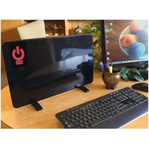A desk with a Cozy Legs® Personal Comfort Heating System.