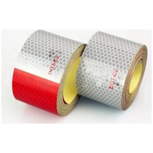Two rolls of DOT Approved Conspicuity Tape on a white surface.