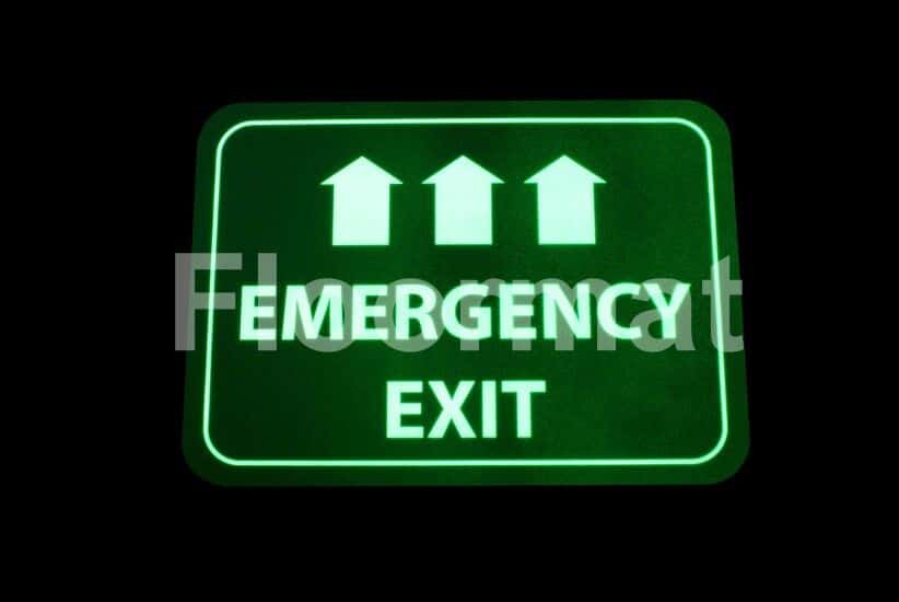 A green sign indicating the Emergency Exit.