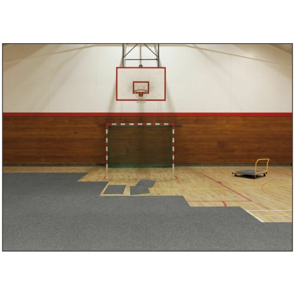 A basketball court with a Floor Safe Tile that provides enhanced safety.
