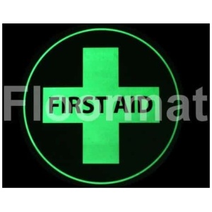 A First Aid Photoluminescent sign on a black background.