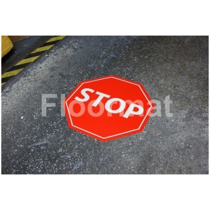 A floor-mounted Stop Sign (Octagon) in a building.