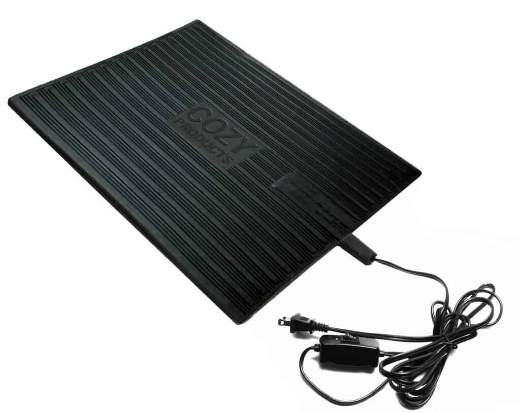 A black electric Foot Warmer Floor Mat with a cord attached to it.