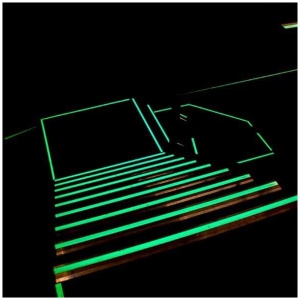 An image of a Glow in the Dark Egress Marking Tape lit staircase.