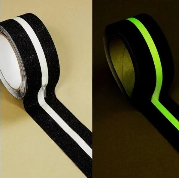 A black and green grip tape with a glow in the dark stripe.