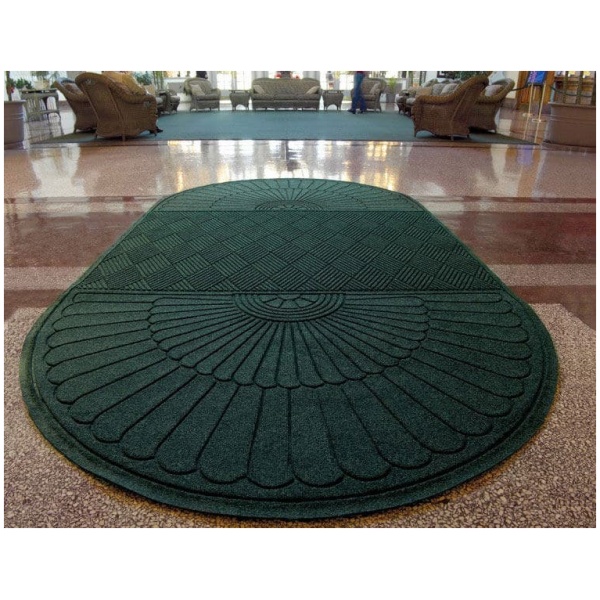 green two ends Floormat.com Fashionable Wiper - Scraper Mat with Fabric Border <ul> <li>3/8” thick bi-level surface effectively removes and stores dirt and moisture beneath shoe level</li> <li>Rubber reinforced face nubs prevent pile from crushing extending performance life of product</li> <li>Unique “Water Dam” allows the Waterhog mat to trap water and dirt stay on mat</li> <li>6'x7' and 6'x10' are not available in aquamarine, gold, light green, orange, purple, solid red, white, yellow</li> </ul> If you are looking for all of the performance features and exceptional beauty of the Waterhog Eco Grand Premier - but would prefer them in a 24 ounce option, WaterHog Grand Classic is the perfect choice. It offers the same durable fabric border as well as 3 configurations to give you the ultimate in beauty and performance. <ul> <li>Durable 24 oz./sy. polypropylene bi-level face maximizes dirt and moisture stopping characteristics.</li> <li>A <b>green friendly rubber backing</b> made of 10-15% recycled rubber content.</li> <li>Special Tri-Grip cleated backing.</li> <li>Anti-static.</li> <li>100% solution-dyed to eliminate fading.</li> <li>All Waterhog Mats are certified slip resistant by the National Floor Safety Institute.</li> </ul> <img class="alignright size-full wp-image-14975" src="https://www.floormat.com/wp-content/uploads/waterhog-color-full-1.jpg" alt="" width="1380" height="232" />