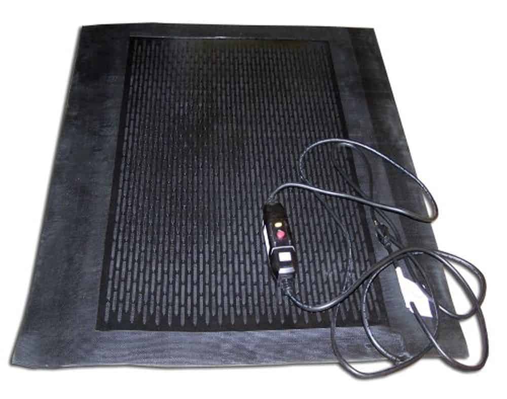 An electric heating pad with a cord attached to it.