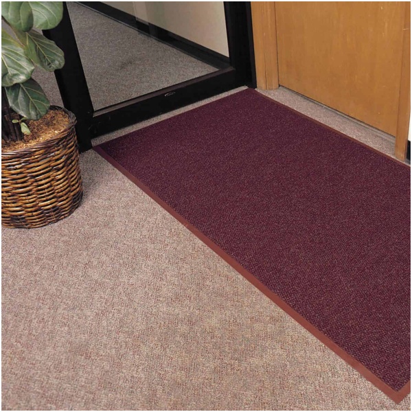 polynib 2 1 Floormat.com Polynib® has the rich, luxurious look of Berber-style carpeting for an always elegant appearance. A very tightly nibbed loop of needle-punched yarn entraps and hides debris while retaining moisture at the same time. 24 ounces of carpet per square yard provides greater crush resistance for long lasting wear. Polynib® comes with a heavy-weight vinyl backing in corresponding colors to help reduce mat movement and enhance the aesthetic appeal of the mat. <ul> <li>Tightly nibbed loop construction entraps debris and hides it for an always elegant appearance</li> <li>24 ounces of needle-punched yarn per square yard</li> <li>1/4 inch overall thickness for use in narrow clearance doorways</li> <li>Vinyl backing in corresponding colors helps reduce mat movement</li> <li>Recommended product as a part of the GreenTRAX™ program for “Green Cleaning” environments</li> <li>Custom lengths available (3', 4', and 6' widths)</li> <li>Available Colors: Charcoal, Slate Blue, Brown, Hunter Green, Gray</li> </ul>