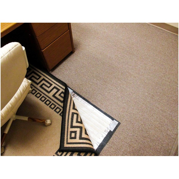 rugbuddy 05 Floormat.com A unique, energy-efficient electric space heater for under area rugs. Keep warm in proven solution. RugBuddy is great for the elderly and even in dog and cat beds. We recommend our <a href="https://www.floormat.com/klimagrip-non-slip-insulation-pad/">KlimaGrip Non Slip Insulation Pad</a> under your RugBuddy to reduce slipping and to reflect heat away from the floor. There is also an optional <a href="https://www.floormat.com/programmable-outlet-plug-in-thermostat/">Programmable Outlet Thermostat</a> that is available to set the temperature of the RugBuddy to a specific temperature, while also allowing the user to program when they would like the RugBuddy to be turned on and off. <ul> <li>Heats quickly, maximum temperature reached within 15 minutes of being turned on</li> <li>maximum temperature of between 95-110 degrees</li> <li>Only heat rooms in use</li> <li>Lower your thermostat</li> <li>No risk of fire</li> <li>No risk of shock</li> <li>No dust circulation</li> <li>No electromagnetic radiation (EMR)</li> <li>Sealed unit, may be cleaned with a damp sponge.</li> </ul> <h2>RugBuddy Turns Carpets & Rugs into Heated Floors</h2> Like an electric blanket for your floor, RugBuddy is the only portable heating system in the world approved for use under area rugs. Rug Buddy is an innovative heating system that turns rugs into “invisible” space heaters and lets you stay warm and keep your sense of style. <b>RugBuddy can be used to supplement heat in chilly rooms, or specific areas in a room off a single electrical circuit or thermostat. Even different areas within one room, such as a desk and sitting area, can be heated from a single plug or thermostat.</b> RugBuddy is the attractive solution for warming cold spots in any room of the home or office. You simply place the heating mat under your area rug and plug it in. RugBuddy is guaranteed safe no matter what type of floor covering is under your area rug (stone, tile, wood, laminate, vinyl, and/or carpet). Instantly eliminate those cold spots in your home with this versatile, high-tech, portable electric radiant heating blanket instead of space heaters. Perfect on top of existing hard surface flooring that feels cold or over already installed carpets in your bedroom or living room to add that extraordinary on-demand heating comfort right at your feet. <h2>Benefits</h2> <ul> <li><b>Energy Efficient</b> <ul> <li>Lower your thermostat</li> <li>Only heat the rooms you're in</li> <li>Just pennies a day to operate</li> </ul> </li> <li><b>Safe</b> <ul> <li>No risk of fire</li> <li>No risk of shock</li> <li>GFCI protected</li> <li>Waterproof</li> </ul> </li> <li><b>Healthy</b> <ul> <li>No EMR</li> <li>No dust circulation</li> <li>No carbon monoxide</li> </ul> </li> <li><b>Durable</b> <ul> <li>Rolling office chairs are OK</li> <li>Furniture legs OK</li> <li>Washable - even steam clean your carpets</li> </ul> </li> <li><b>Simple</b> <ul> <li>Lay down RugBuddy</li> <li>Lay down area rug</li> <li>Plug in and enjoy</li> </ul> </li> </ul> Our heating system can be used as a primary heating, supplementary, or floor warming. Susan of New Hampshire sent us this about RugBuddy: “I was a bit skeptical at first, but I'm very happy with the two mats I bought. One is next to the shower and the other under my feet right now! My cats LOVE them. I have been telling everyone I know about them, too. I weave rag rugs from old cotton clothing. They are relatively thin (1/4") and the mats work well under them. I believe they might be good for Diabetics and for people who have had some kind of chemotherapy and either have no feeling in their feet or who are sensitive to cold. I live in NH and it is cold in my house. I'm pretty hardy but used to get into bed at night with cold feet. NOT anymore!” Rhonda Haulish of Elkhart, Indiana has this to say about RugBuddy: “This is just a note to tell you how pleased we are with your product. We purchased 2 pads (RugBuddy) to go under carpeting in our family room, which is located over an un-heated crawl space. We live in northern Indiana and last December was unusually cold. We put your product to the test. It surpassed our expectations. We have always had to have extra blankets on our chairs for those chilly nights. I have put them away. It’s amazing what a little warmth on the floor can do to keep the entire room comfortable.”
