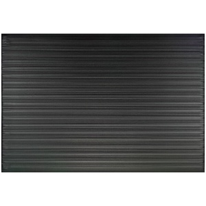 A black tile with a black background and a ribbed Sure Cushion Anti-Fatigue Floor Mat - Ribbed.
