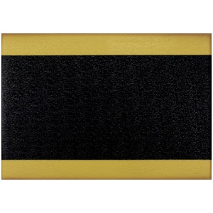 A black tile with a yellow stripe, bordered by a yellow Sure Cushion Anti-Fatigue Floor Mat - Yellow Border.