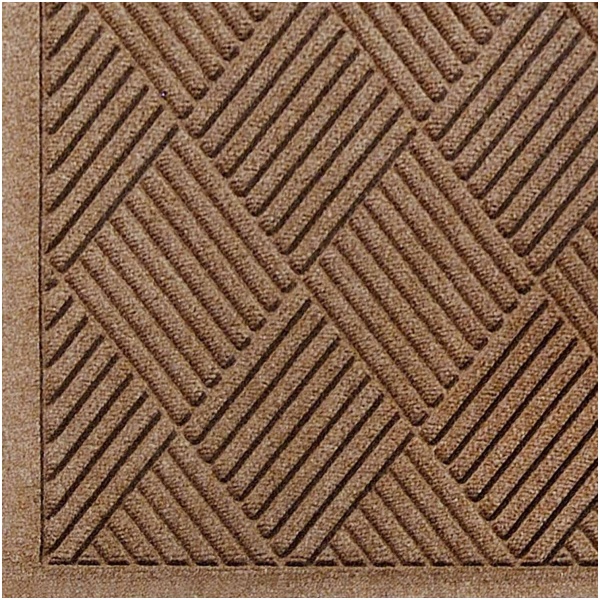 A fashionable WaterHog Fashion Diamond floor mat in tan.